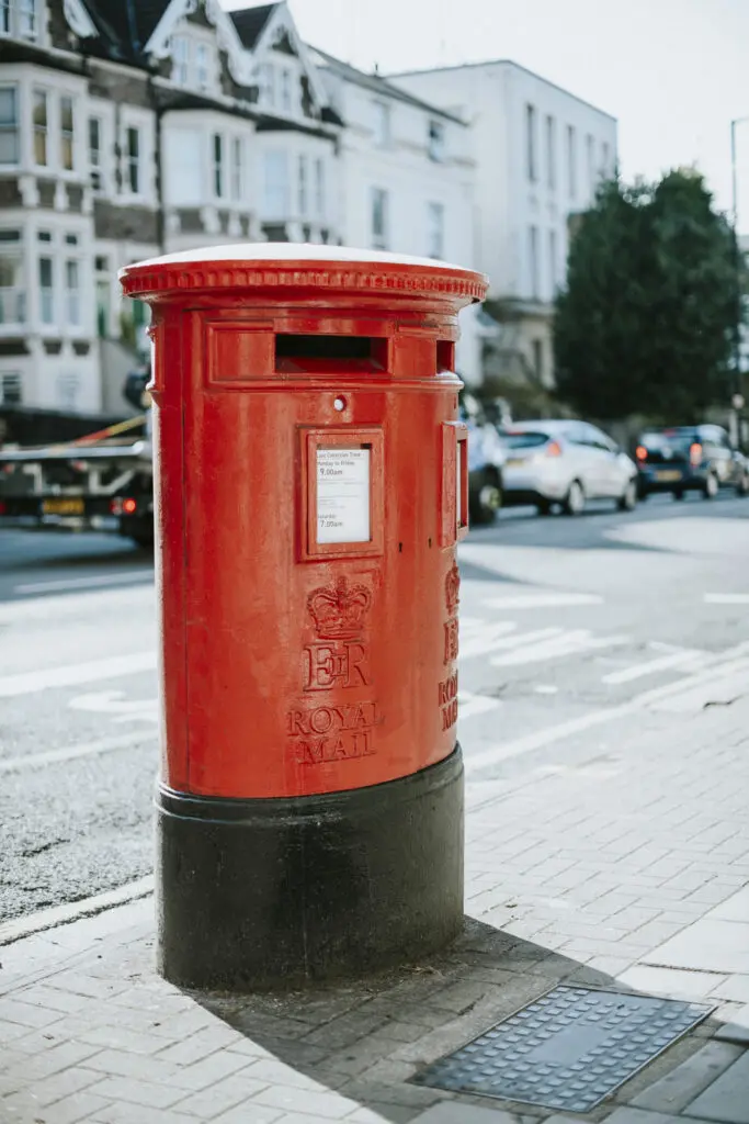 Iconic Red British Mailbox In A City