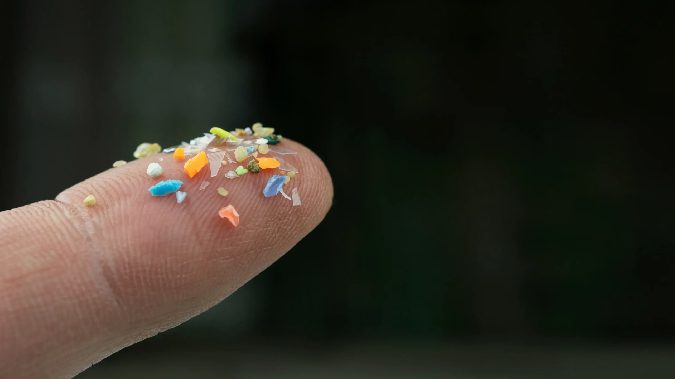 Microplastics On A Finger