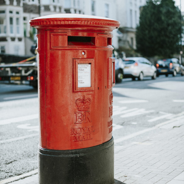 Iconic Red British Mailbox In A City